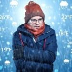 Person in winter attire amid snowflakes; related to Barker Heating & Cooling thermostat settings for energy savings.