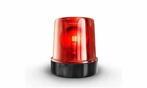 Red emergency light on circular base, indicating urgency in Barker Heating & Cooling HVAC service context.
